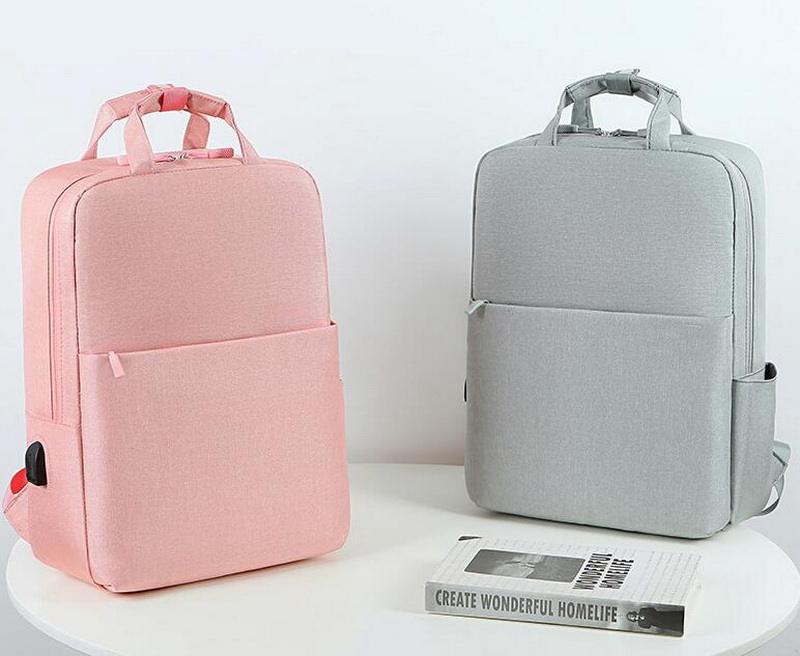 Neuankömmling benutzerdefinierter wasserdichter Tagesrucksack aus recyceltem Haustiergewebe rosa Mädchenschultasche Reiserucksack Laptoprucksack für Frauen